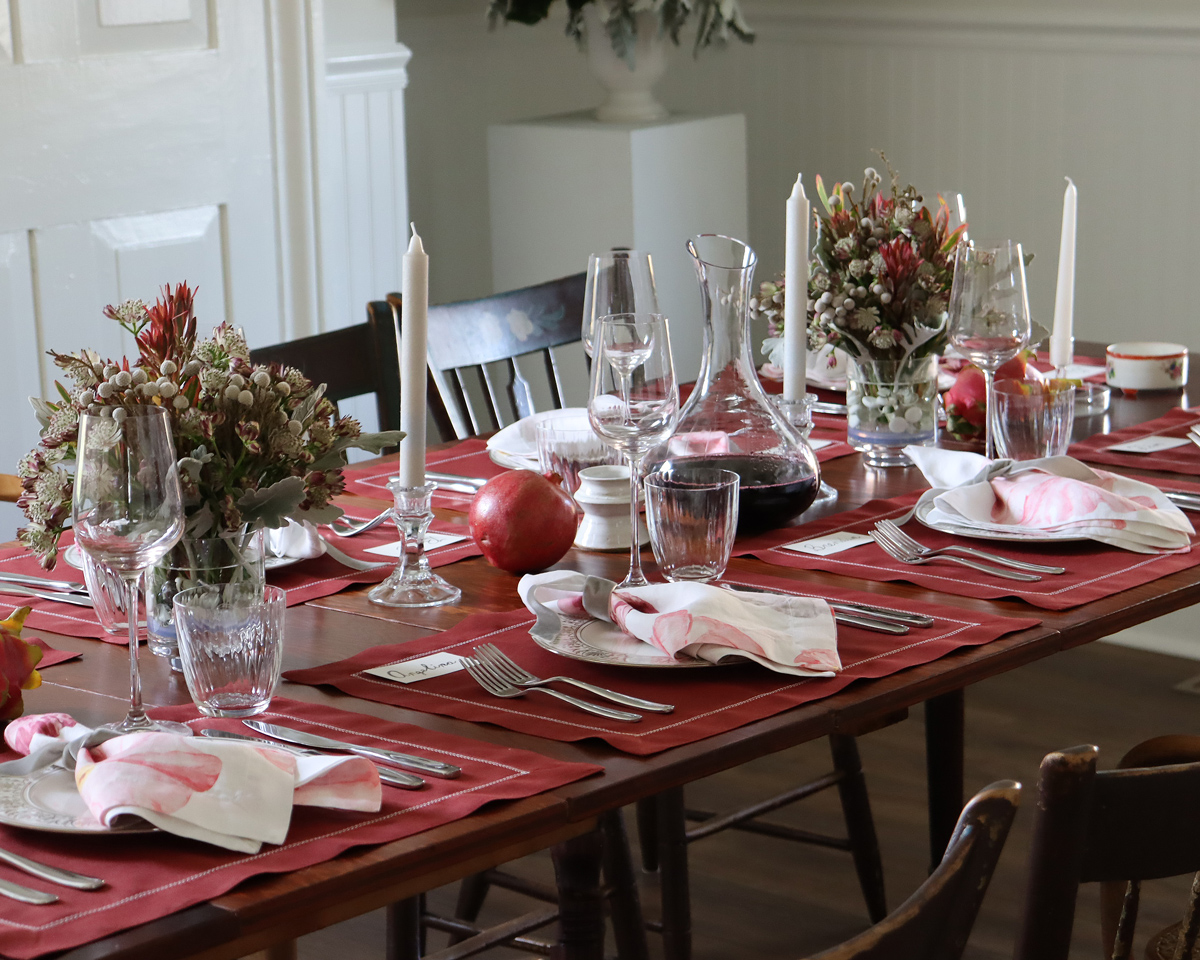 burgundy red linen placemat white trim Christmas placesetting 