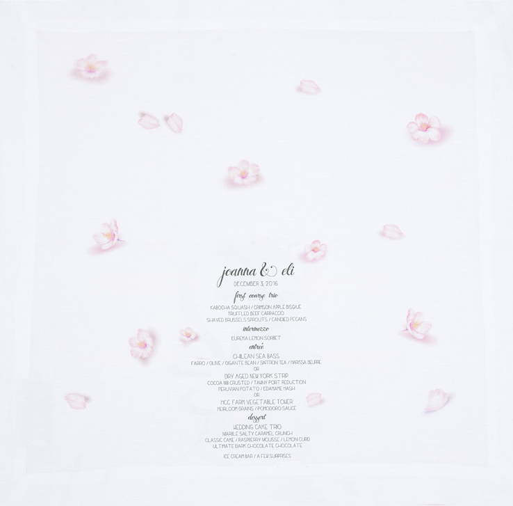 Menu printed on blossom print linen napkin