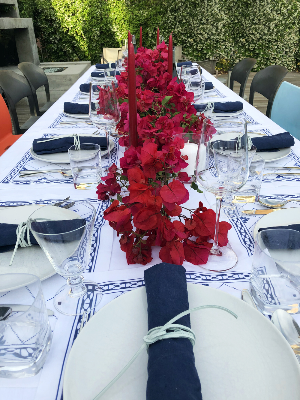 Greek table setting blue and white linens bougainvillea