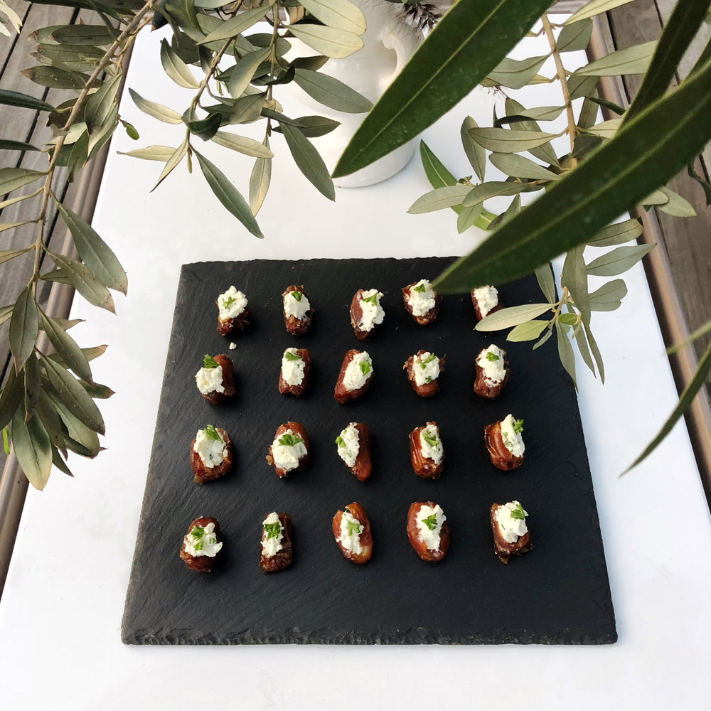 Greek dinner party appetizer goat cheese stuffed dates