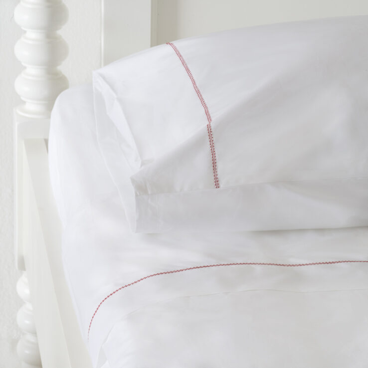 Huddleson white luxury percale sheet set with red hemstitch